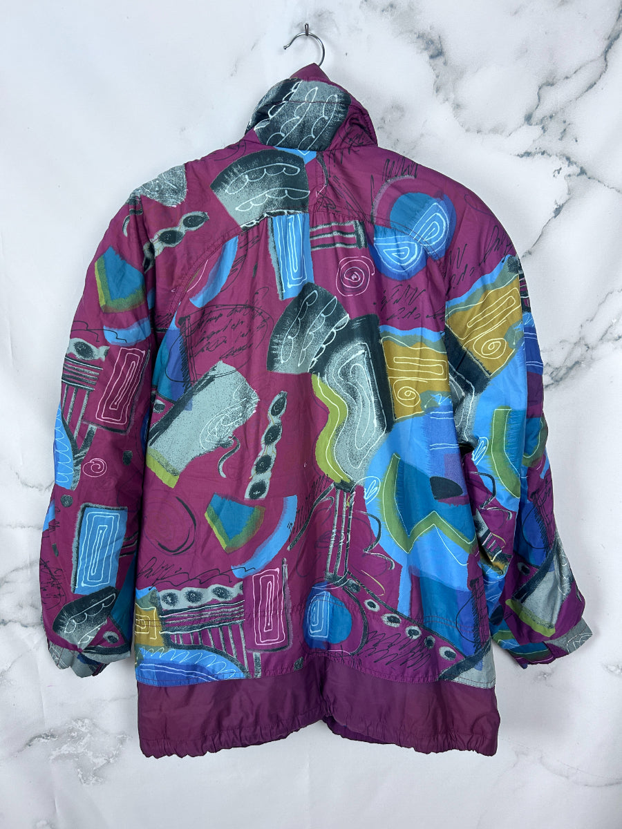 Ski jacket vintage en color burdeos y estampada con bonitos botones frontales