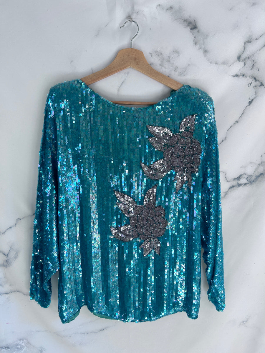 Blusa vintage de fiesta en color turquesa con lentejuelas