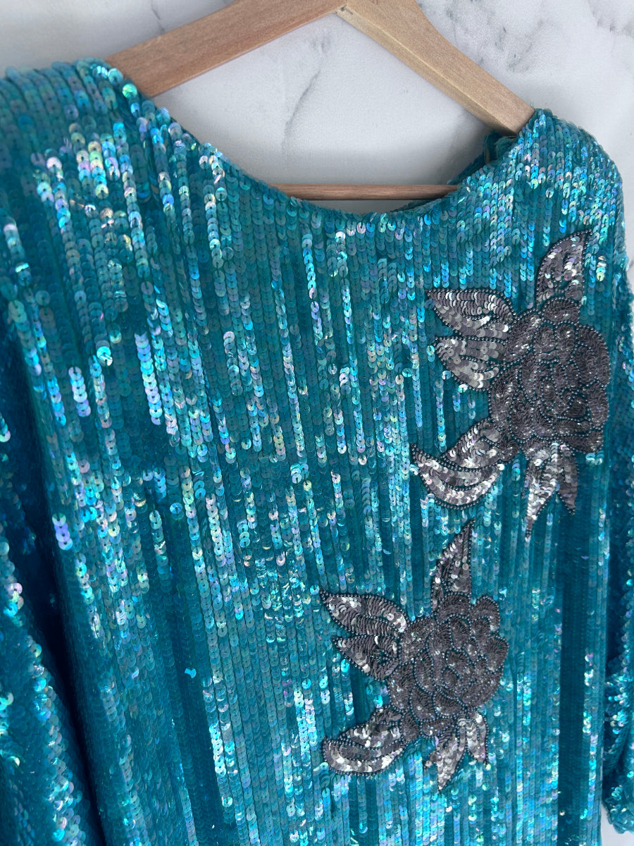 Blusa vintage de fiesta en color turquesa con lentejuelas