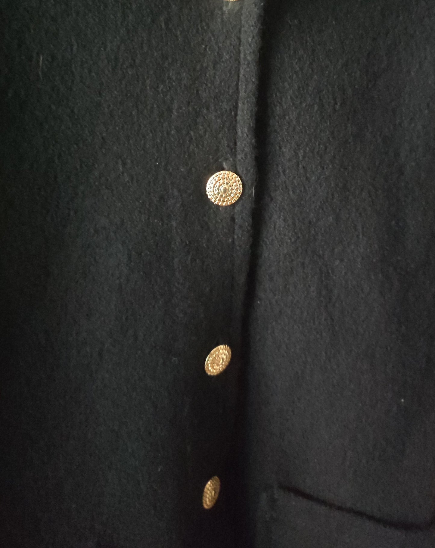 Black coat with gold buttons