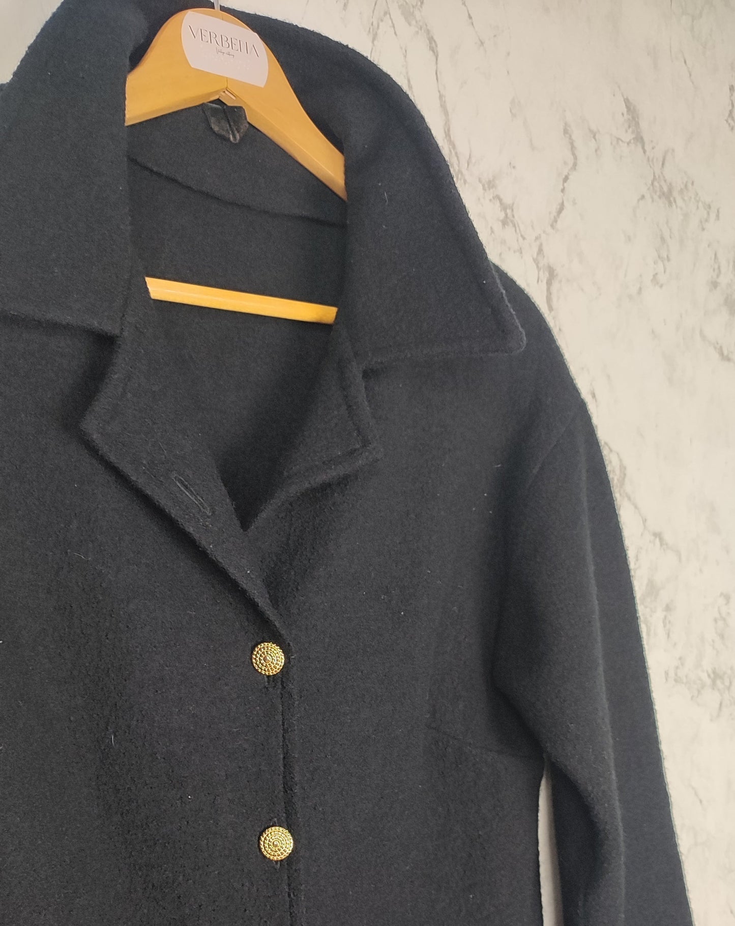 Black coat with gold buttons