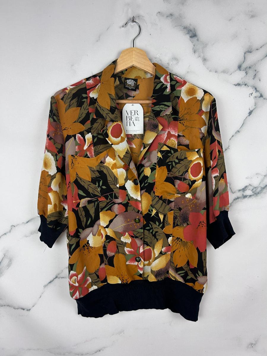 Blusa vintage estampada con patentes