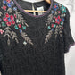 Blusa vintage negra con bordado y lentejuelas