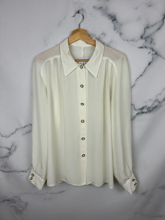 Blusa vintage blanca con bonita caída