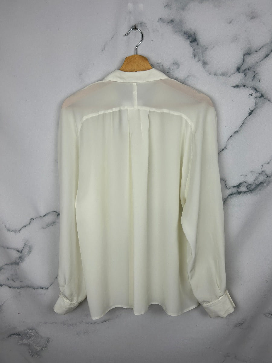 Blusa vintage blanca con bonita caída