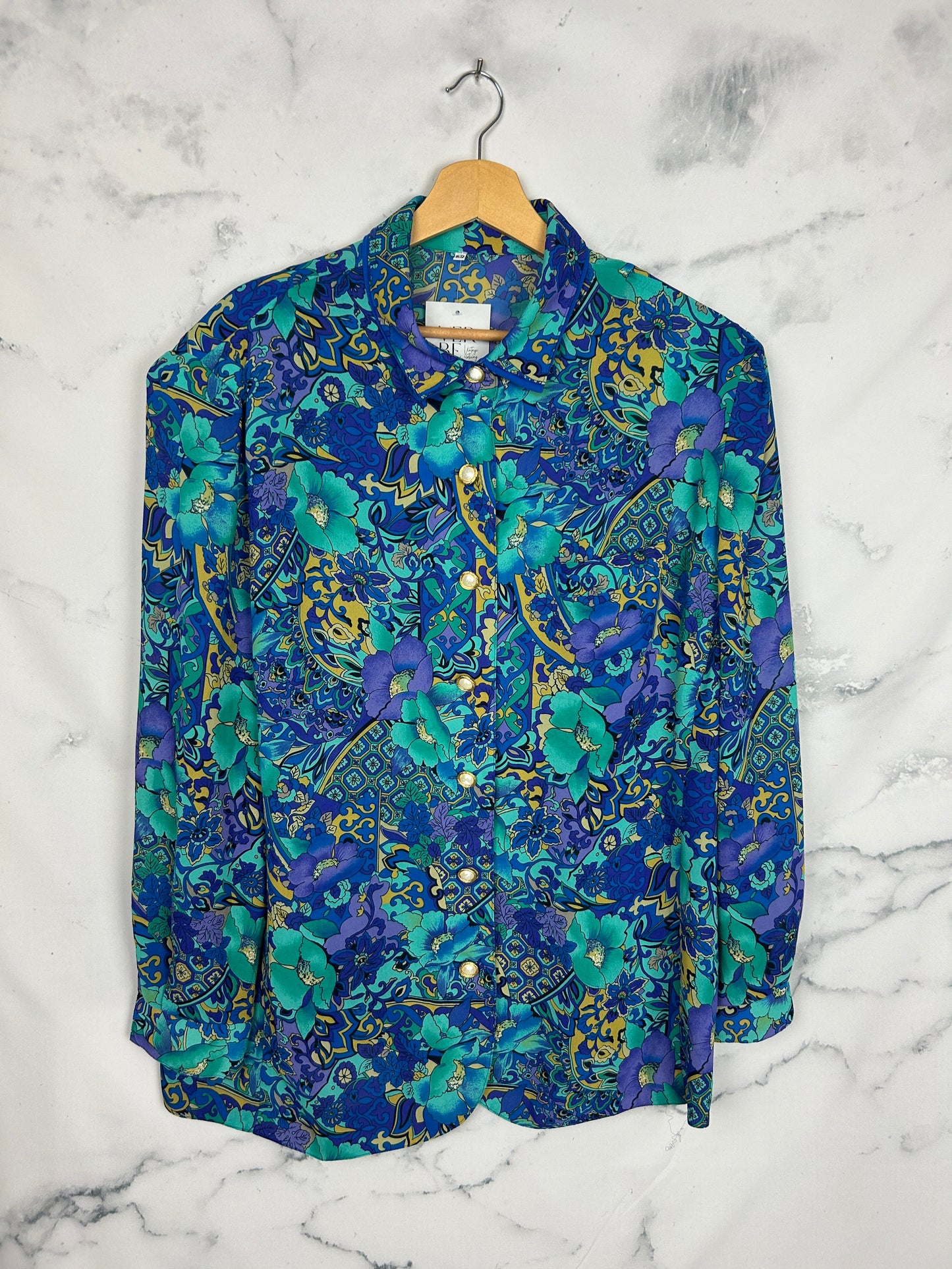 Blusa vintage  con botones joya