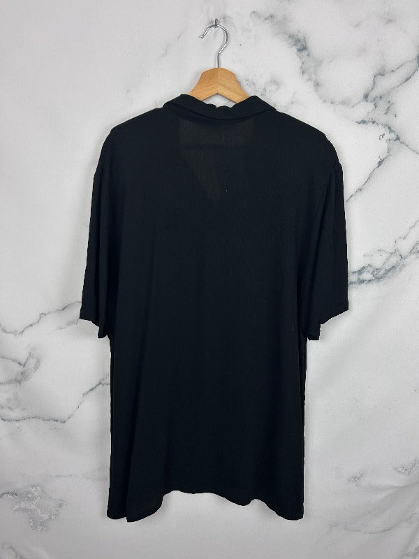 Blusa vintage en negro liso