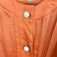 Blusa vintage plisada en color coral