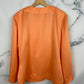 Blusa vintage plisada en color coral