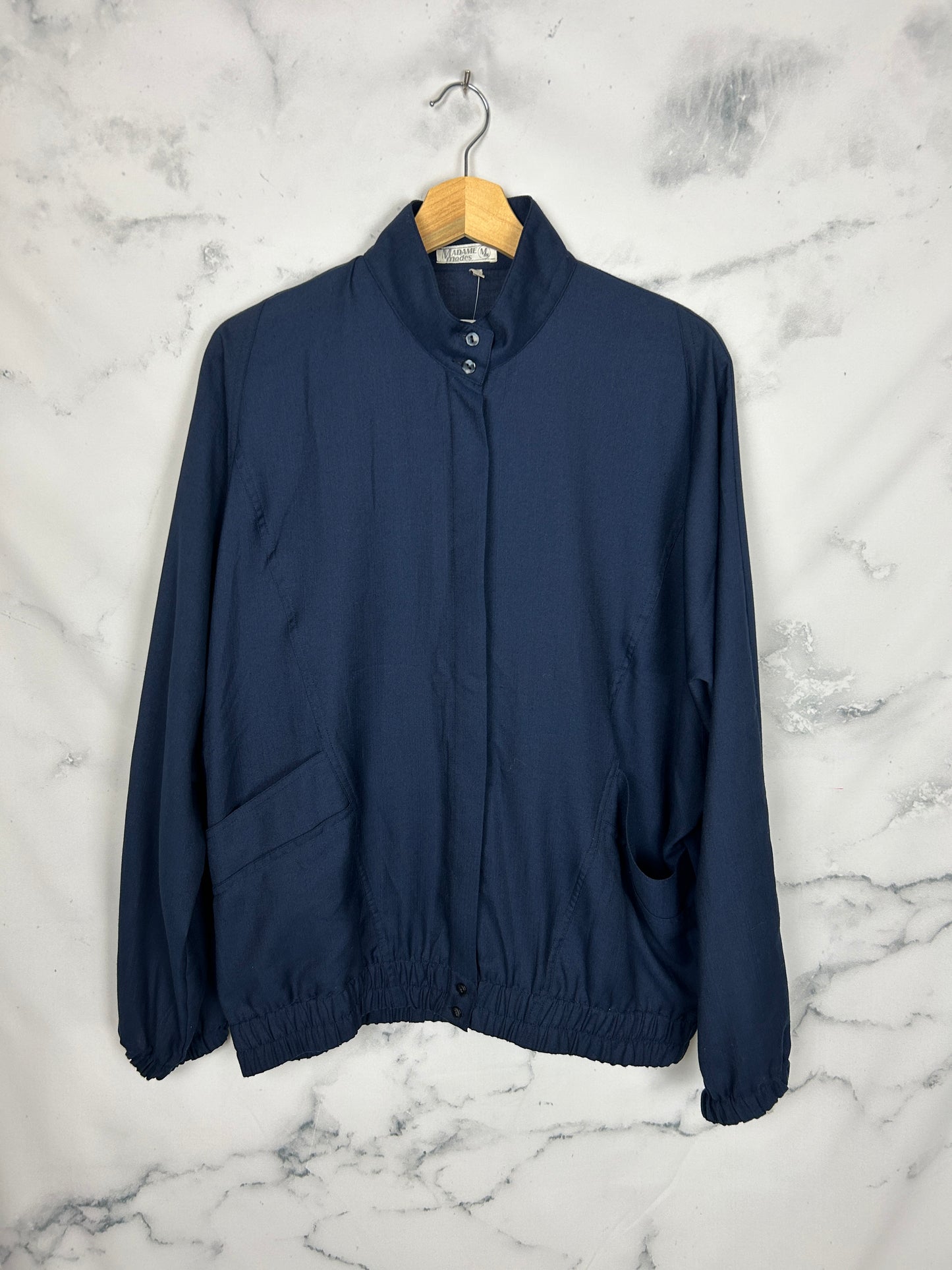 Blusa vintage azul marino con manga de murciélago