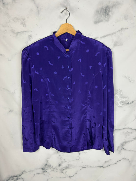 Blusa vintage morada con dibujos geométricos