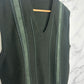 Chaleco vintage verde con detalles verticales