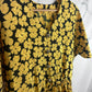 Vestido vintage amarillo y negro con estampado de flores - Clavel